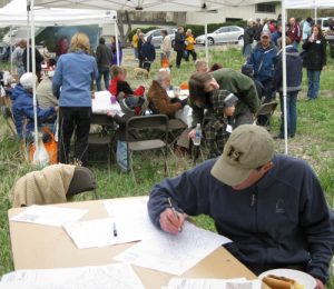 Man signing papers