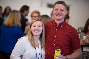 Two people posing for picture