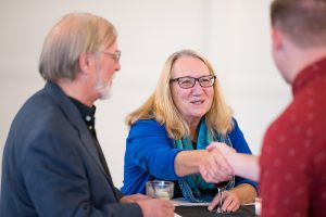 Two people shaking hands