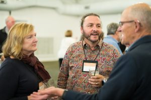 Three people talking in a circle