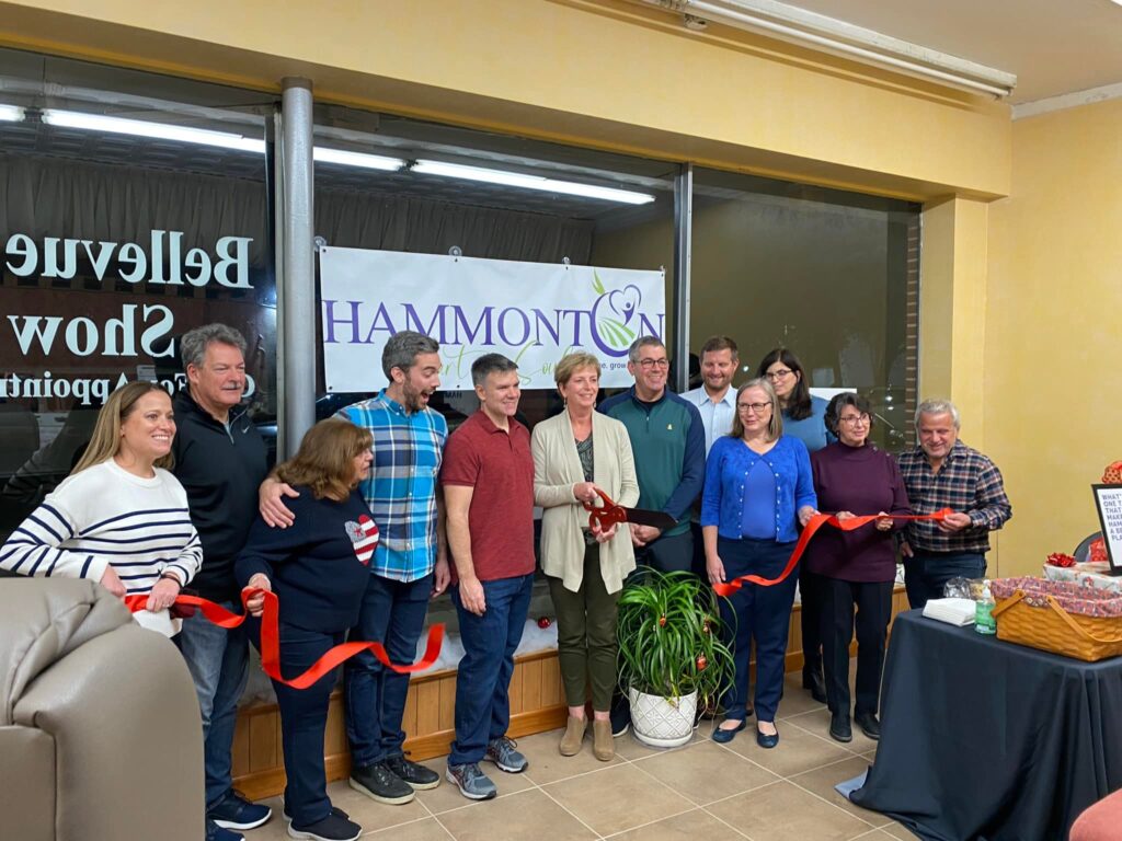 Image of a group of volunteers, community members and Hammonton Heart & Soul Team members at a ribbon cutting ceremony