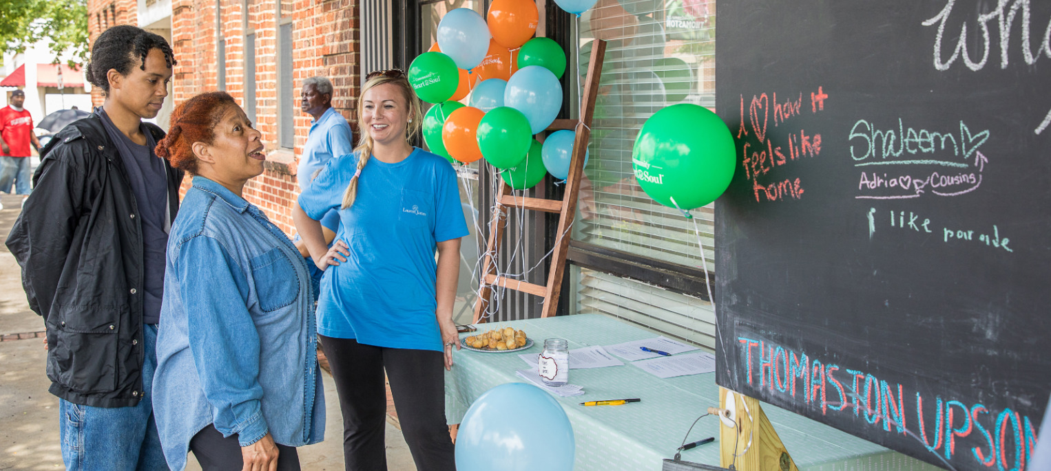 Jennifer Rogers greets residents at the Emancipation Day Celebration