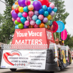 "Your Voice Matters" parade float at Heart & Soul community event