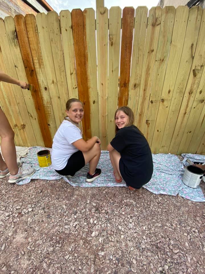 Iowa Akron Youth staining fence