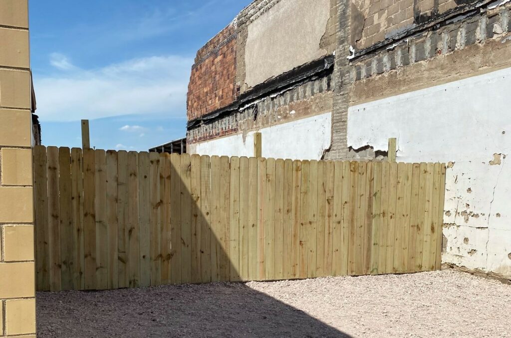 Akron, Iowa, new fence for vacant lot