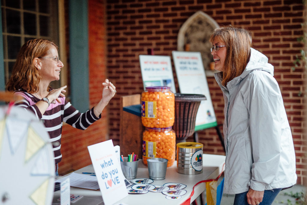 Dillsburg Heart & Soul volunteer speaks with a resident.