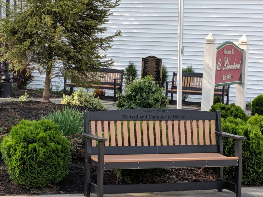 Benches and marker in Mount Blanchard’s Veterans Park (Photo credit: Jackie Porcello)