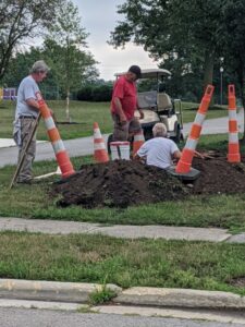 Mount Blanchard volunteers installing the LED digital sign in Hurricane Park
(Photo credit: Jackie Porcello)