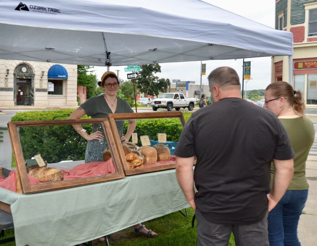 Jackie, owner of the Humble Loaf Bakery in Sanford, is a regular presence at the weekly Farmer’s Market in downtown Sanford. Her breads and sweets are made from quality ingredients, and quickly becoming sought after by those around the state who have purchased her products. She says at her website: “My goal is to become a more present community member by meeting my neighbors and feeding them really good bread.”