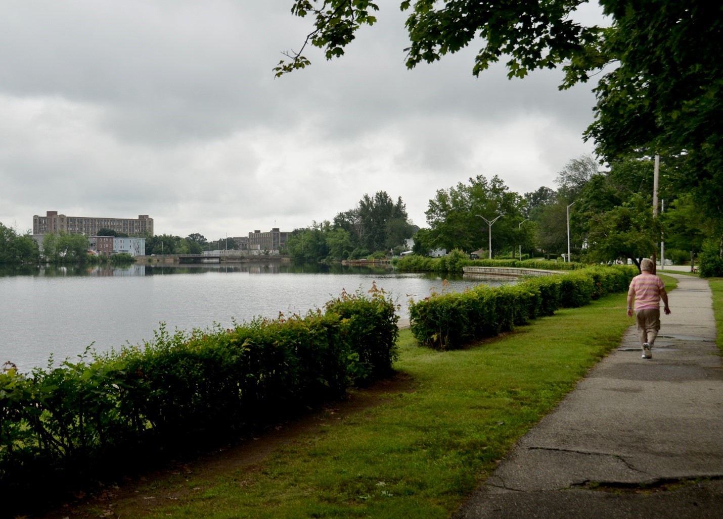 A promenade runs along Pond Number One, beside the William Oscar Emery Drive. The pond is part of the Mousam River, which flows almost 50 miles from its source in the White Mountains to Kennebunk and the Atlantic Ocean. In the 18th, 19th and 20th centuries, a number of dams were built to fuel industry, beginning with sawmills and developing later as textile mills. Today, the river and its ponds thread through a quieter landscape.