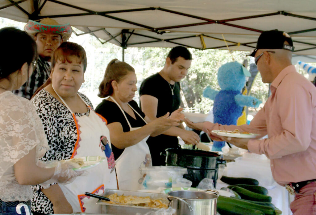 Residents of Cortez, Colorado gather for a potluck.