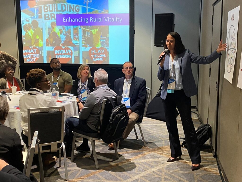 Image from Leading Locally 2025 Conference of breakout session about Community Heart & Soul with attendees and presenter