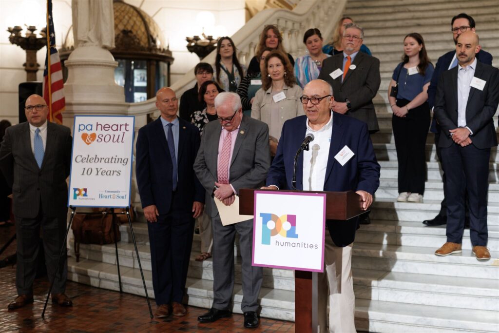 Community Heart & Soul President Mark Sherman addresses an audience from the Capitol Rotunda steps, highlighting the history and growth of the 10-year partnership between Community Heart & Soul and PA Humanities. Photo by Rustbelt Mayberry Photography.