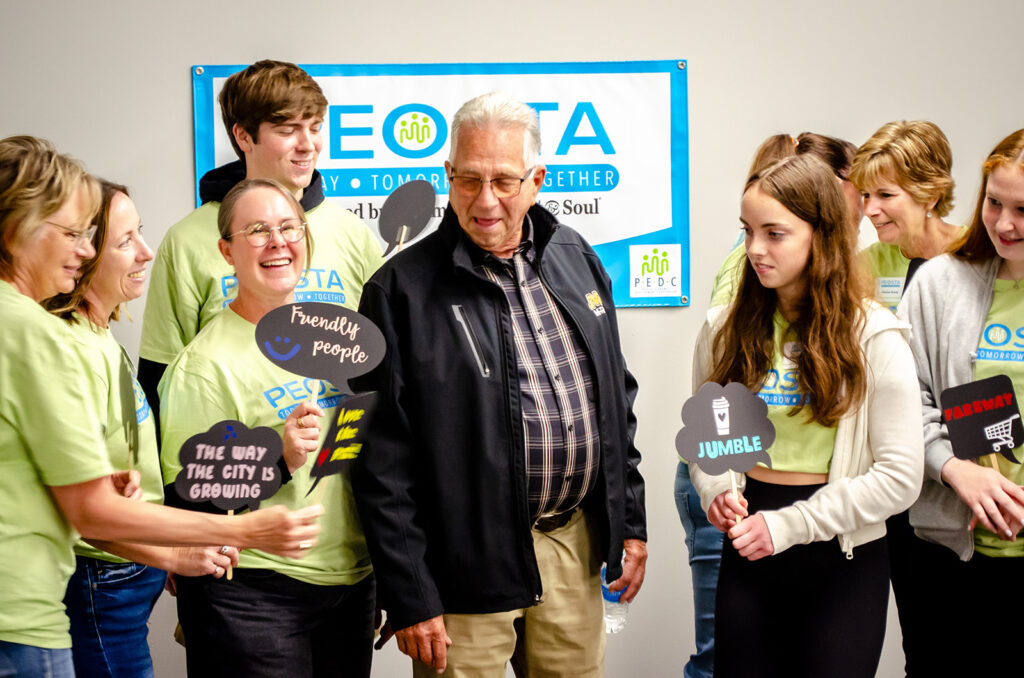 Image of youth volunteers and Peosta Iowa Community Heart & Soul team at Community Summit Open House event