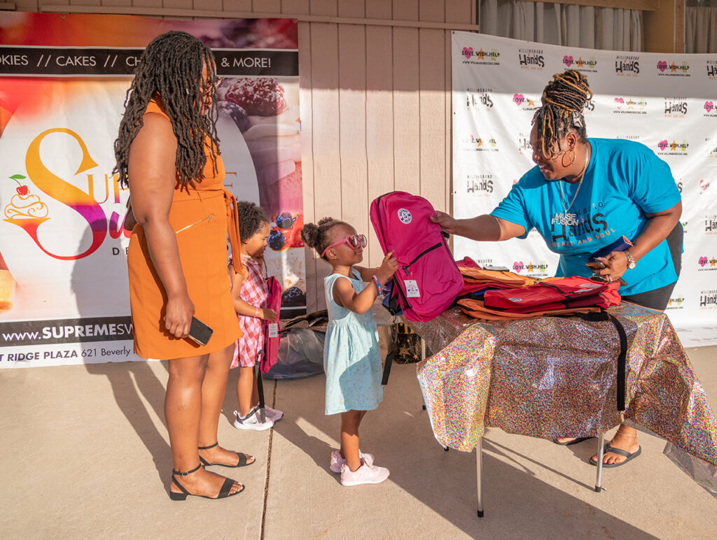Picture of a backpack giveaway for youth